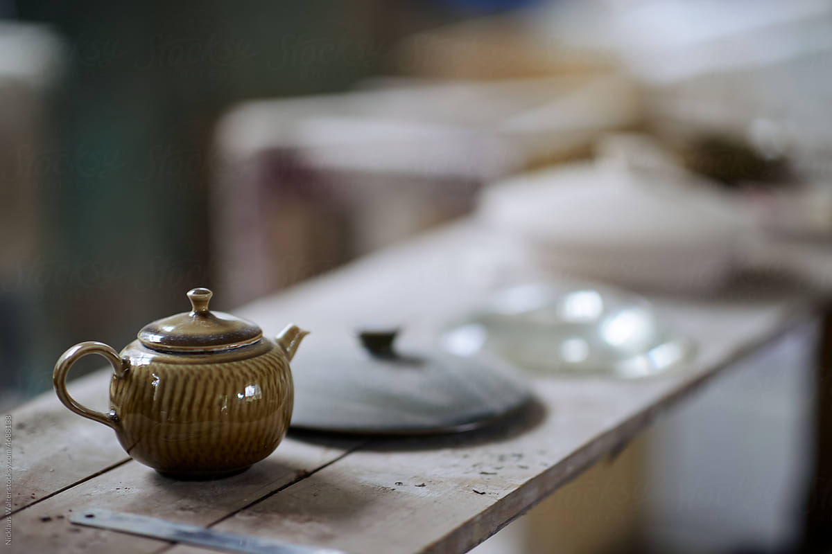 Handmade Ceramic Pottery On A Studio Shelf In Anhui, China.