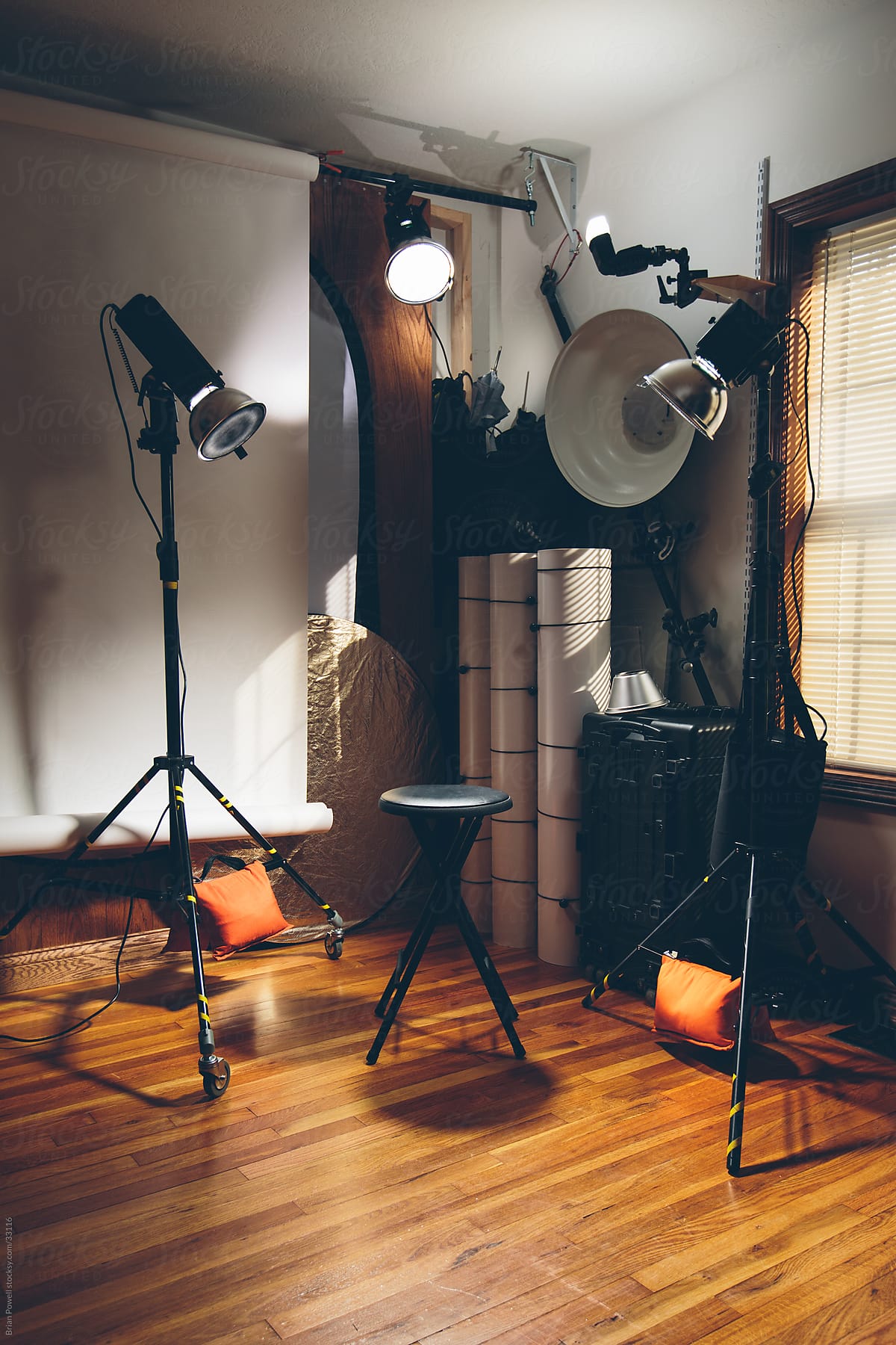 empty photography studio with lighting gear