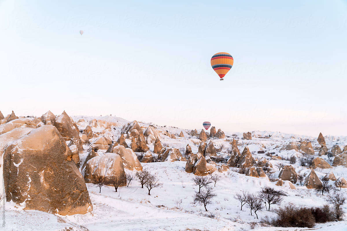 Hot air balloon above Cappadocia snow