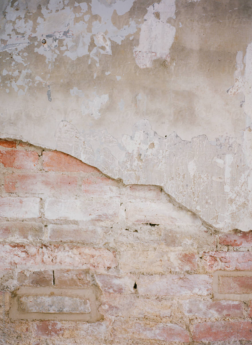 Brick and plaster rustic wall or background