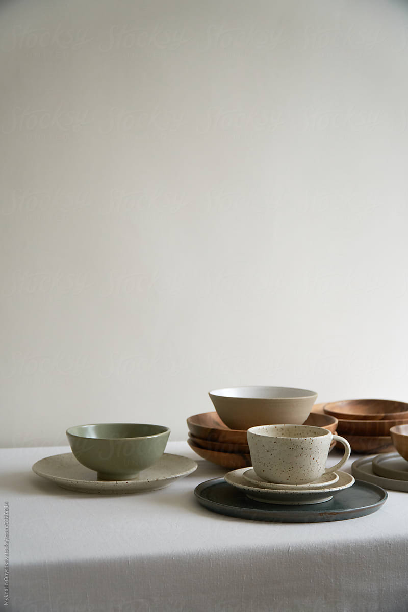 Harmonious Ceramic and Wood Tableware Composition