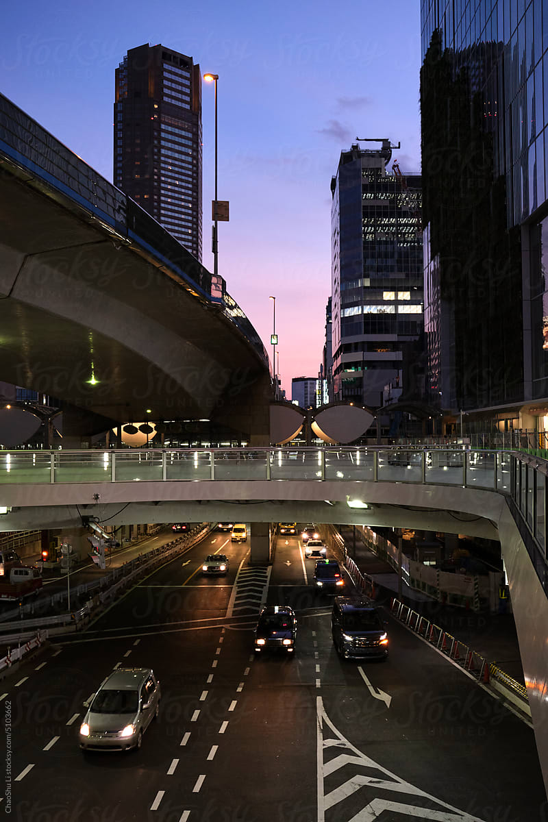 City buildings and overpasses, at dusk