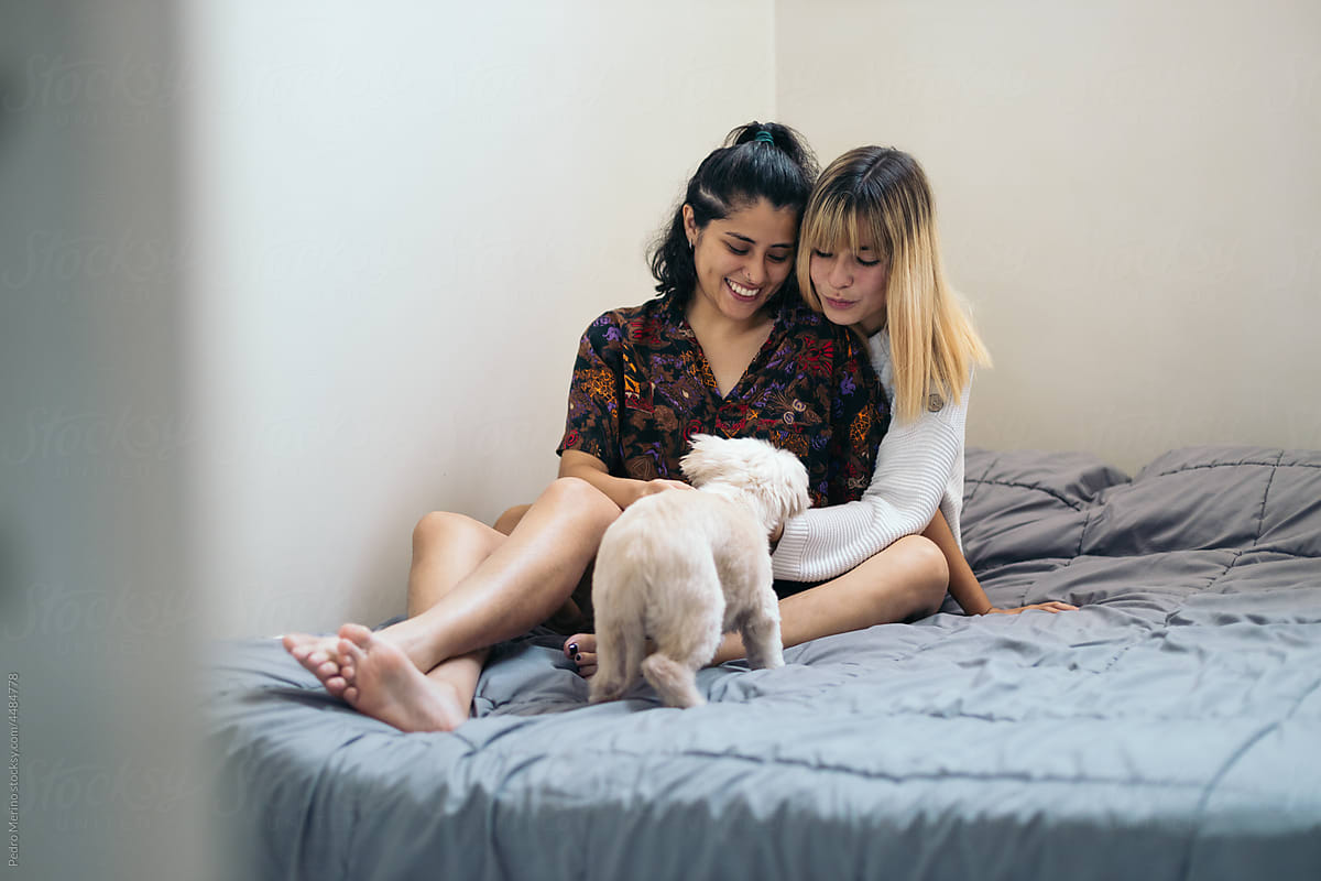 Lesbian couple with dog
