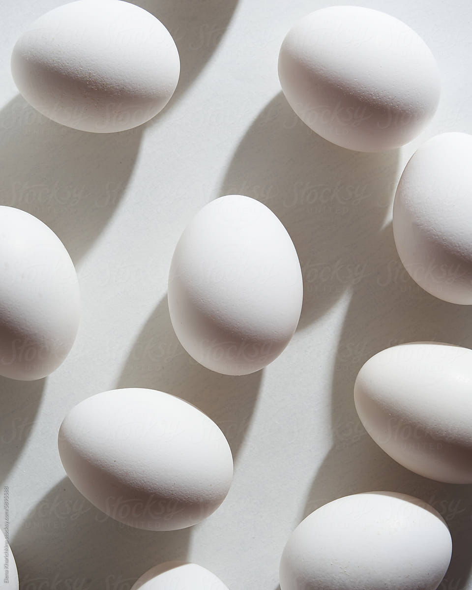 White Eggs on Bright Surface in Soft Lighting