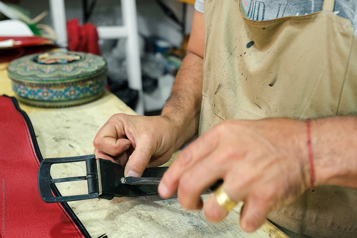 Latin tailor repairing a belt