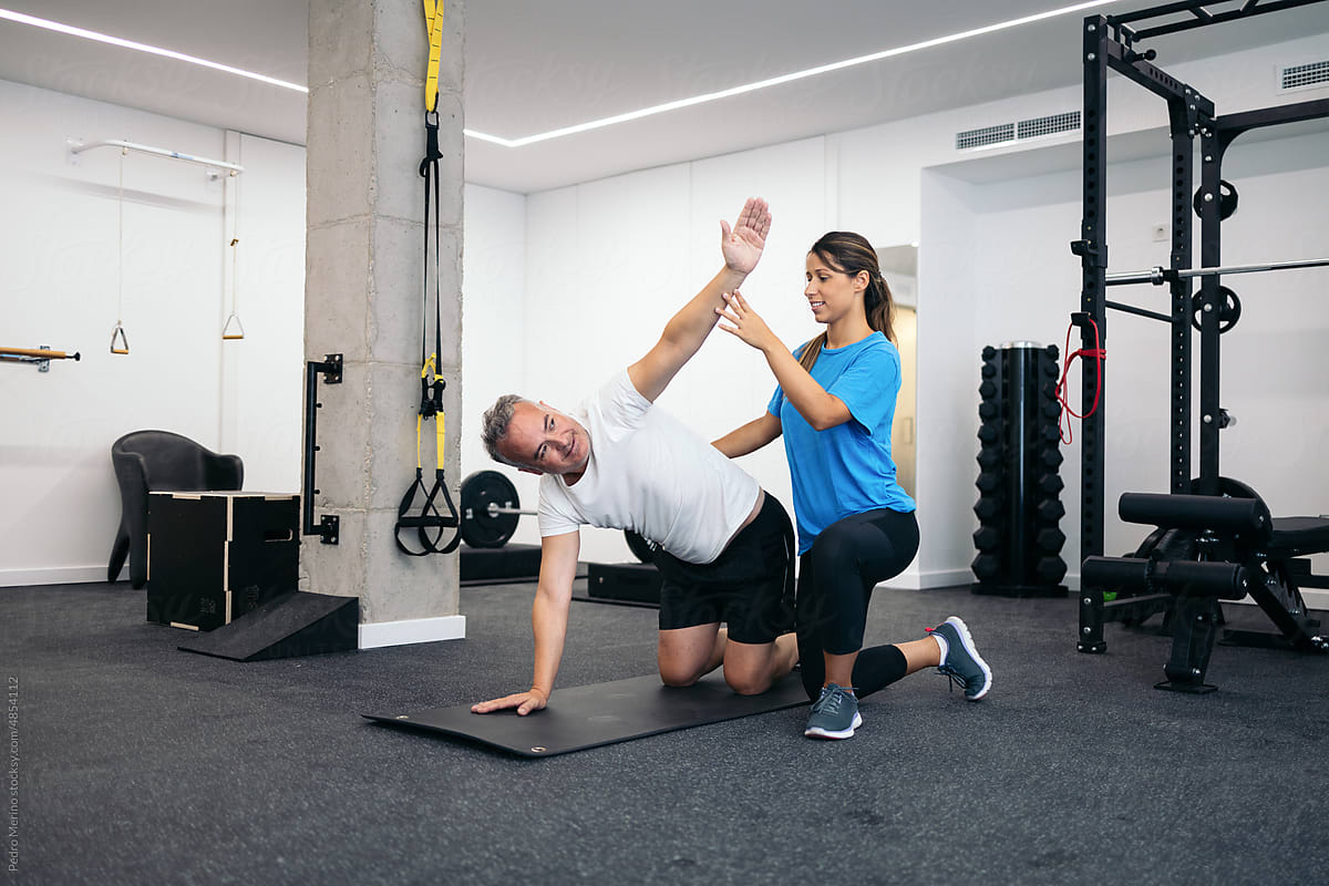 Physiotherapist working in a rehabilitation gym