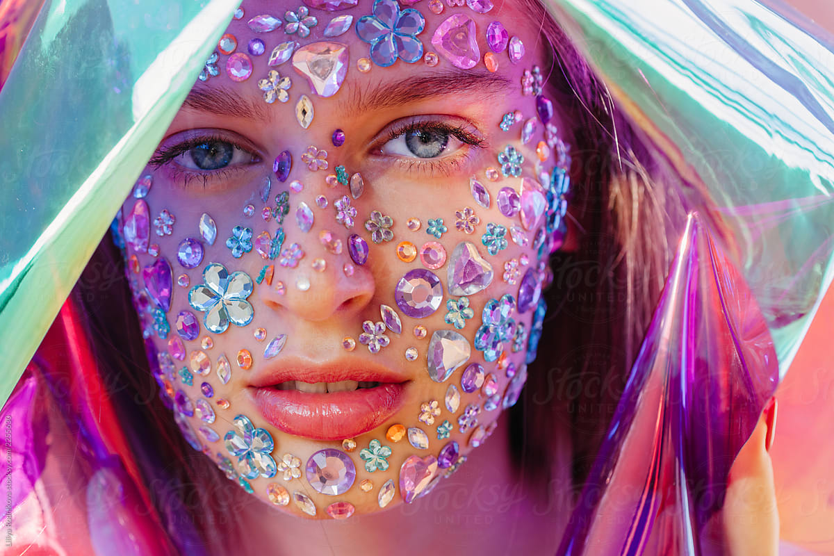 Futuristic Portrait Of Pretty Teenage Girl With Crystals On Her Face