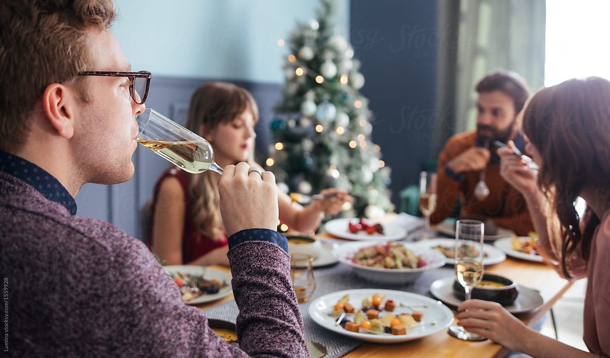 People Enjoying Christmas Lunch