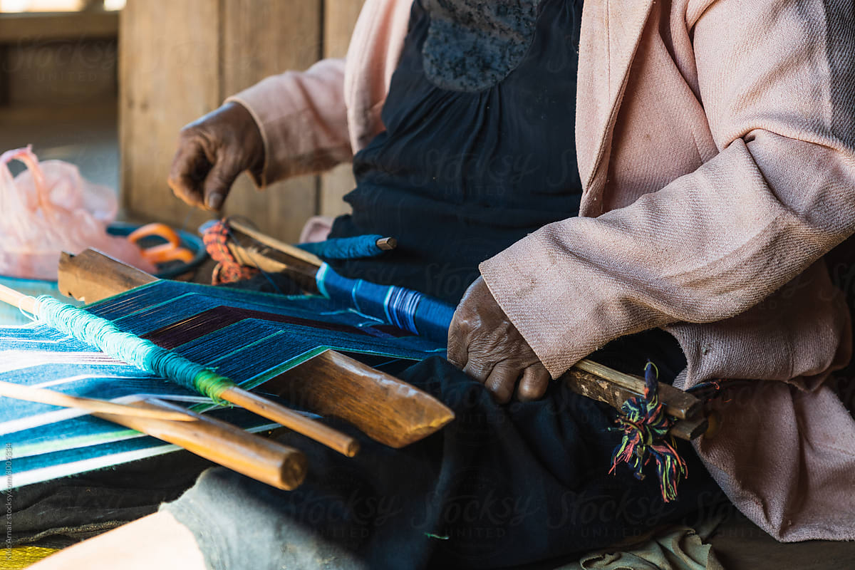 Asian woman weaving