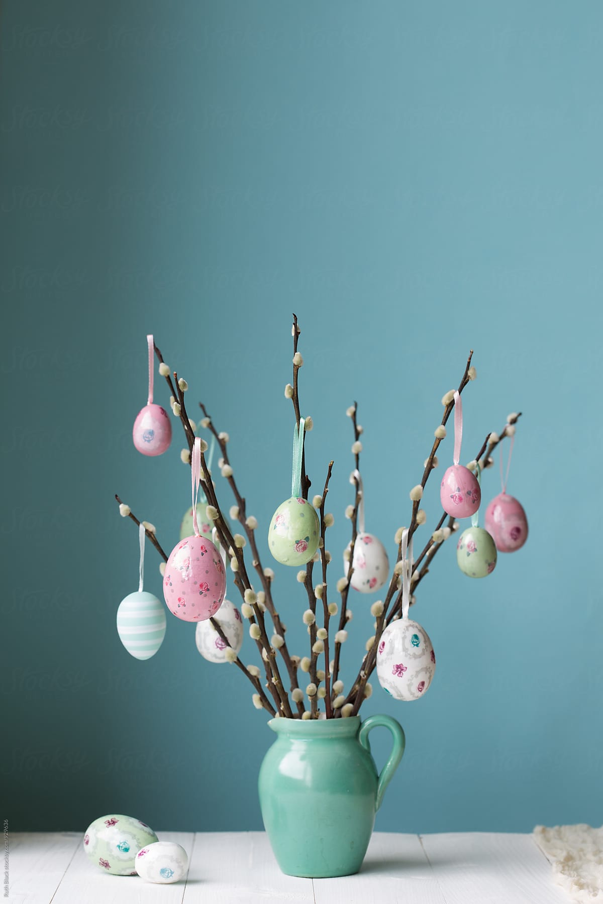 Easter eggs hanging from pussy willow branches