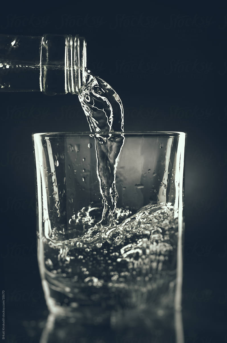 Water Pouring In The Glass