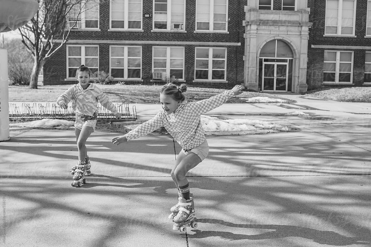Little girls Roller skating at the park