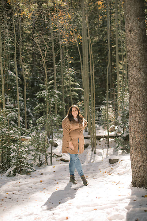 Plus Size Woman Hiking In Snow by Stocksy Contributor Leah Theodosis -  Stocksy