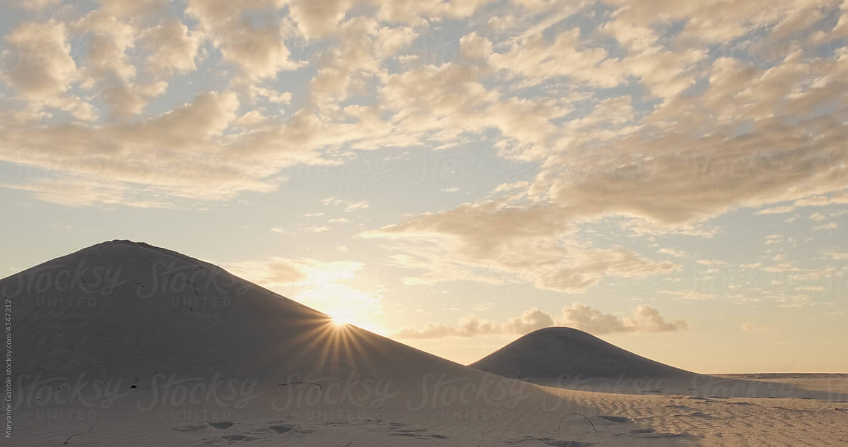 Sunlight and Sand Dunes at Sunrise