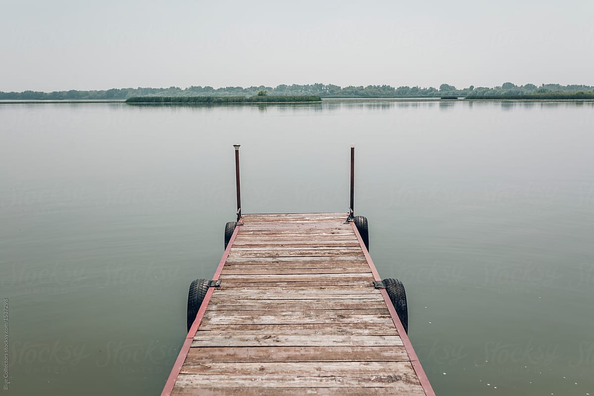 Small And Lonely Pier Of The Lake In A Summer Day by Blue Collectors -  Environment, Nobody