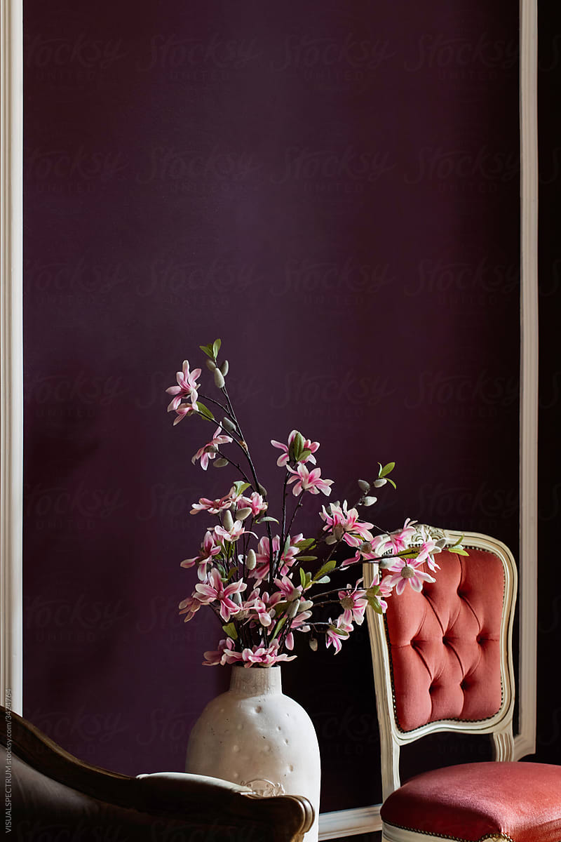 Regal Interior Detail With Chair And Flowers