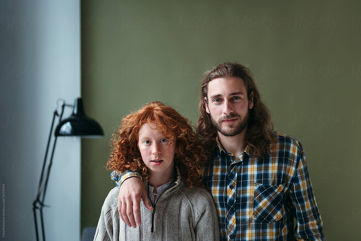 Modern portrait of young adult couple.