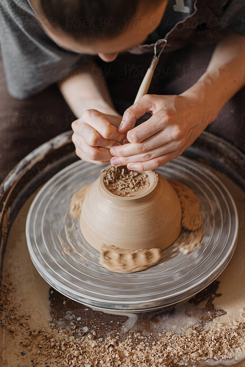 the process of working behind a potter\'s wheel