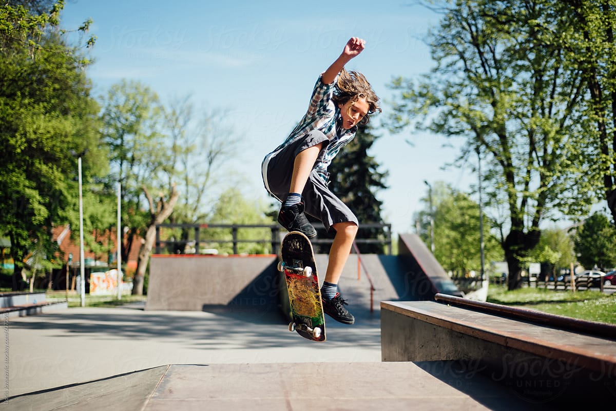 Young boy riding a skateboard