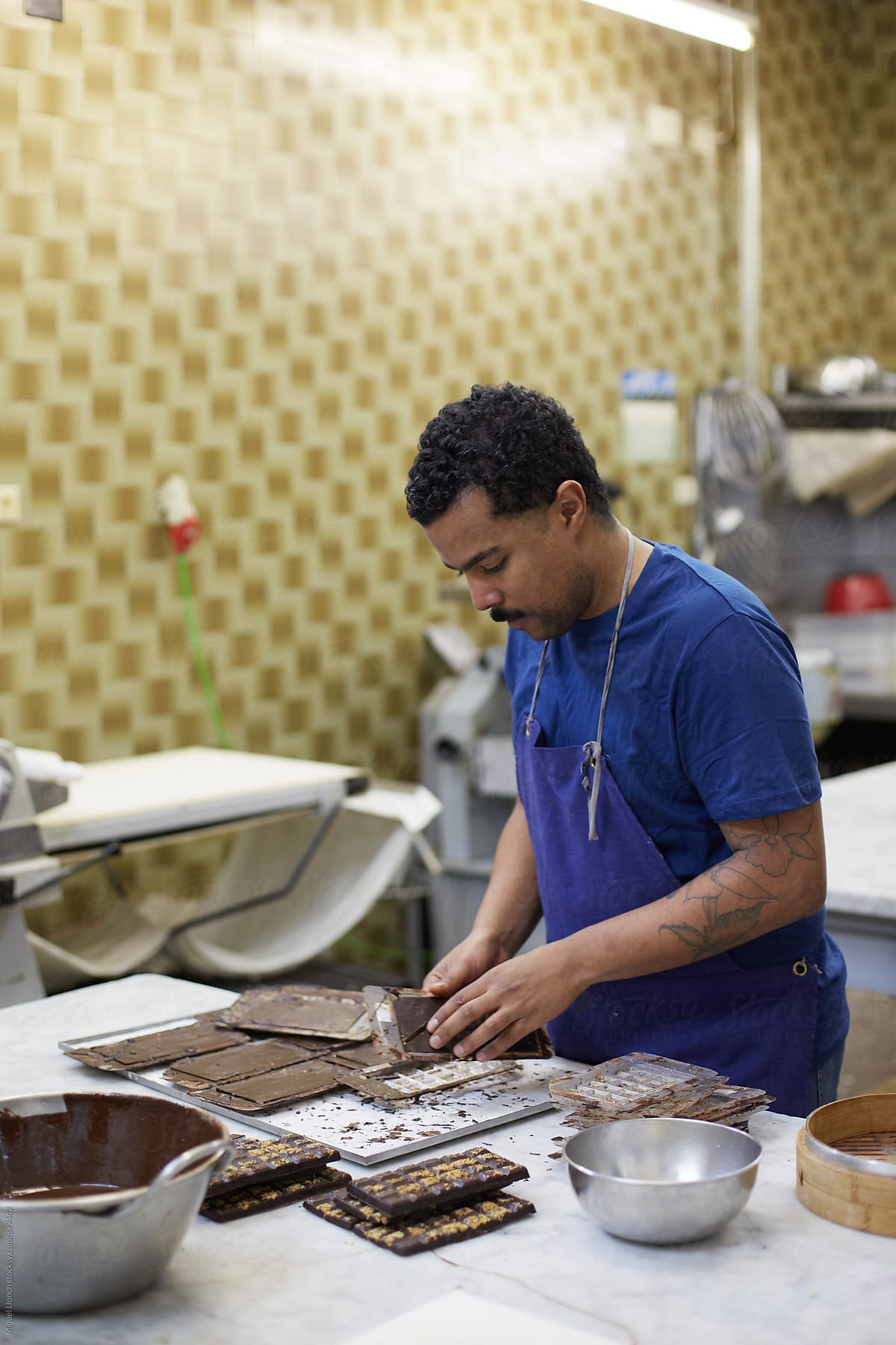 Chocolate artisan working in the workshop