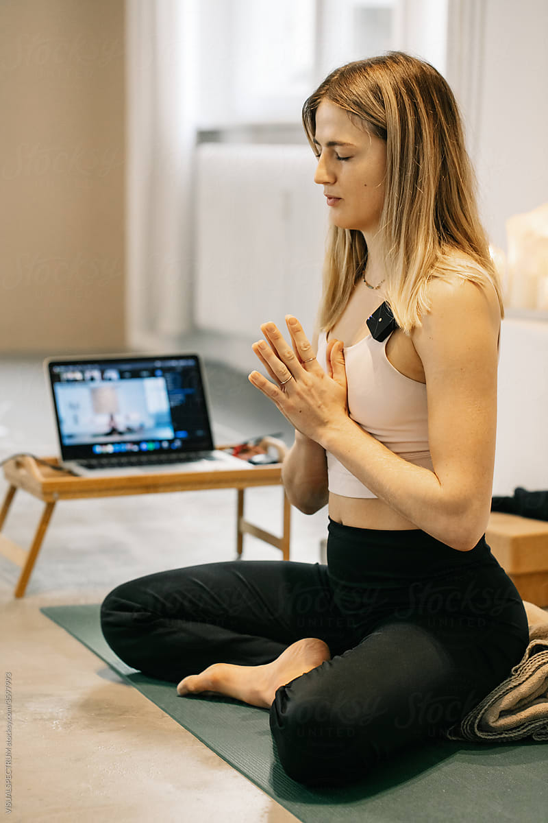 Young Yoga Instructor Teaching Online Mindfulness Meditation Class