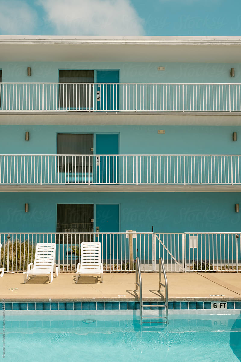 Motel Exterior with Blue Swimming Pool
