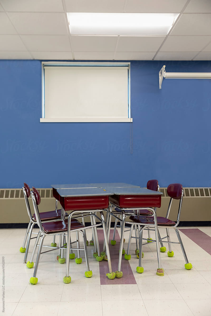 School Classroom Interior with Desk and Chairs with Tennis balls
