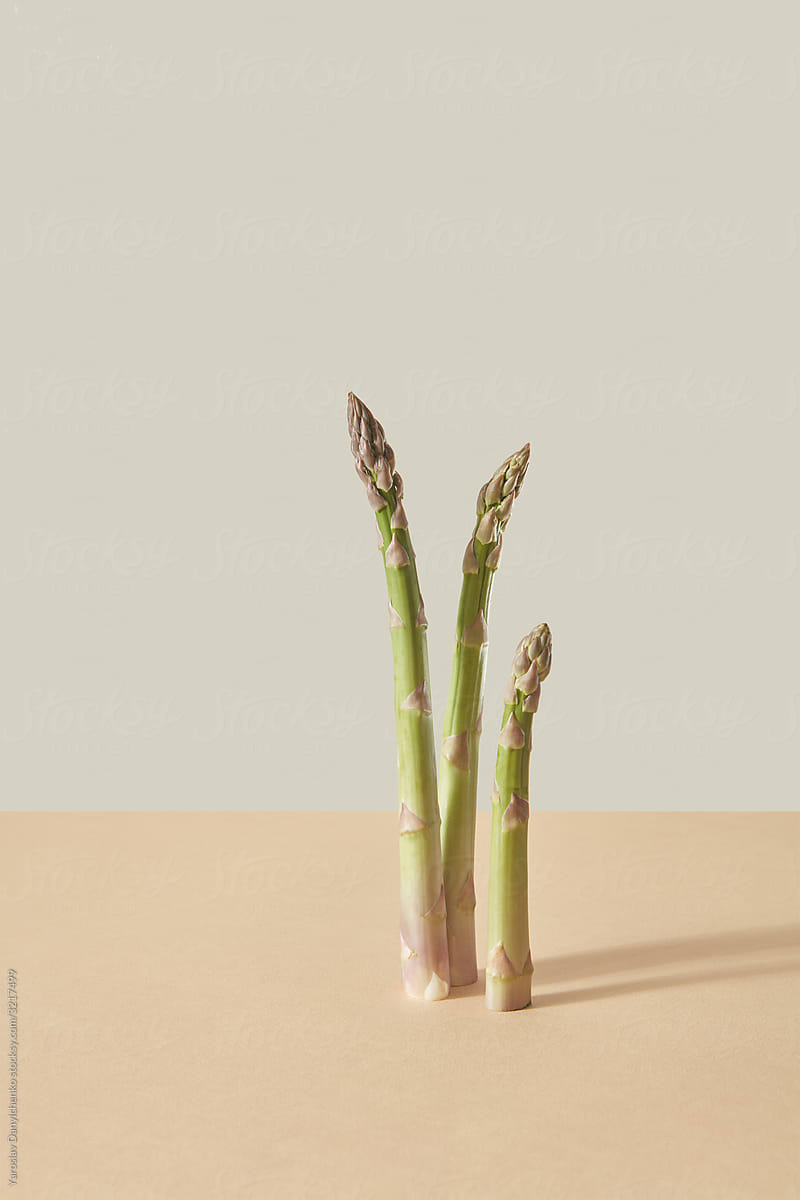 Vertical group of organic asparagus.