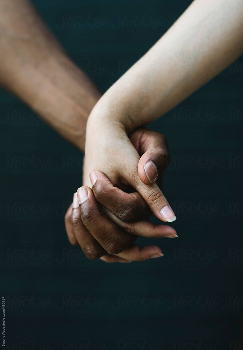 Black And White Holding Hands By Stocksy Contributor Simone Wave