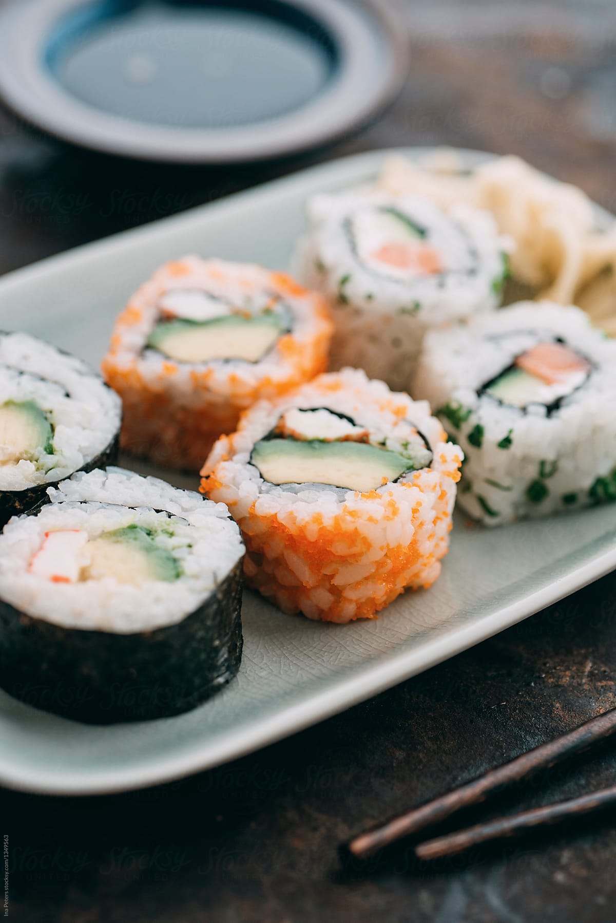 Food: Sushi rolls on a plate with ginger