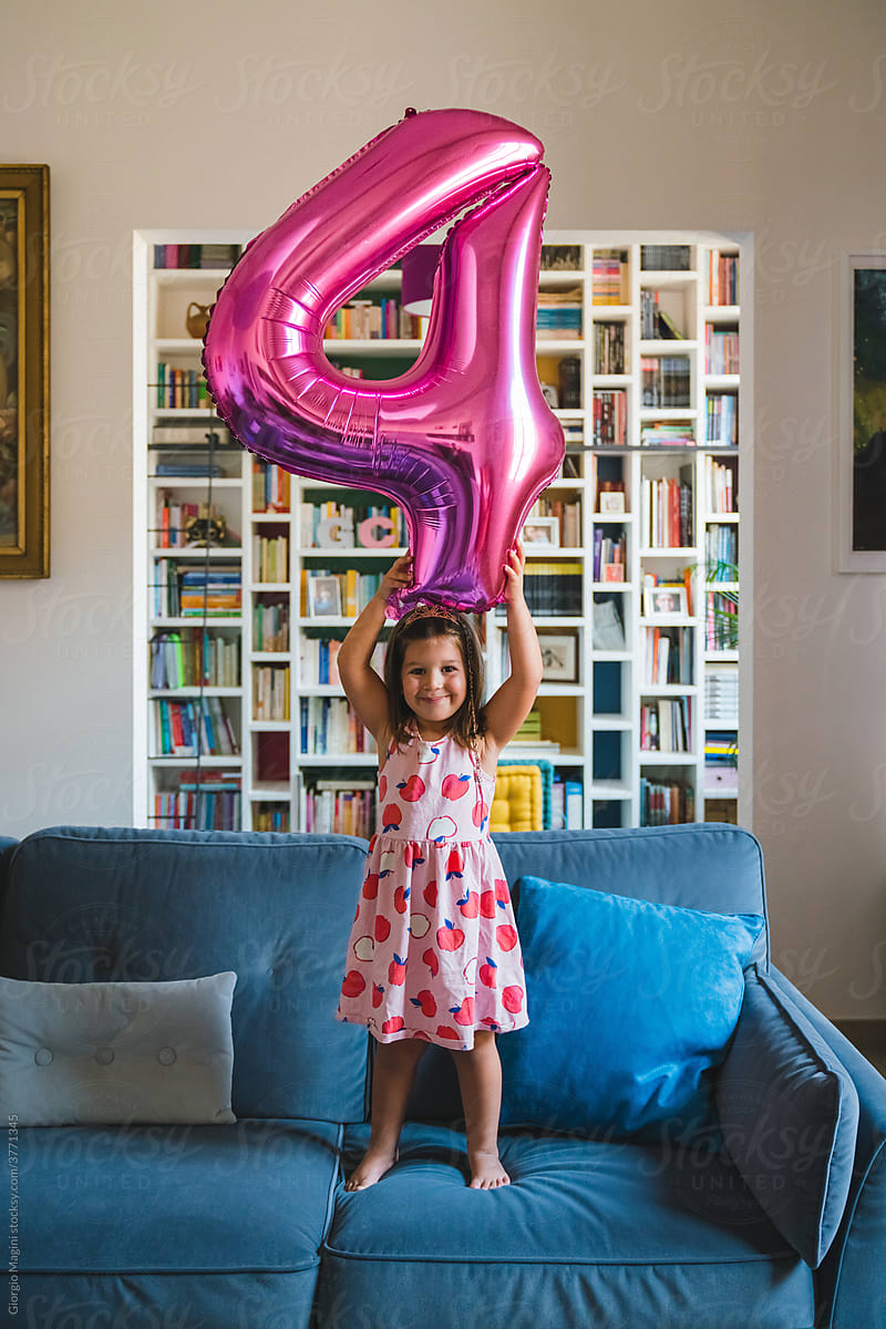 Four Years Old Little Girl with Pink Balloon