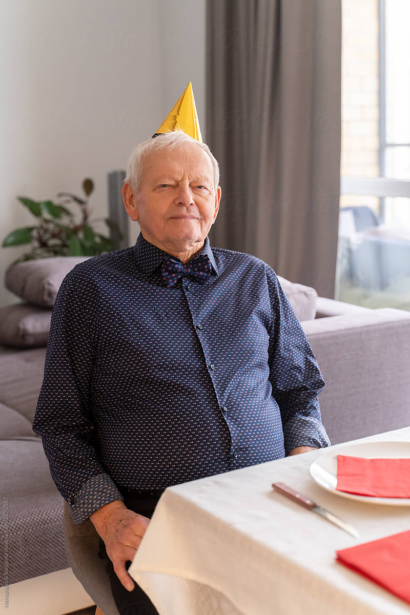Senior Man Celebrating Birthday At Home