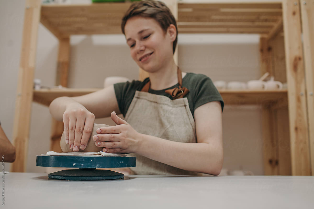 Young Woman Working In Pottery Del Colaborador De Stocksy Sergey