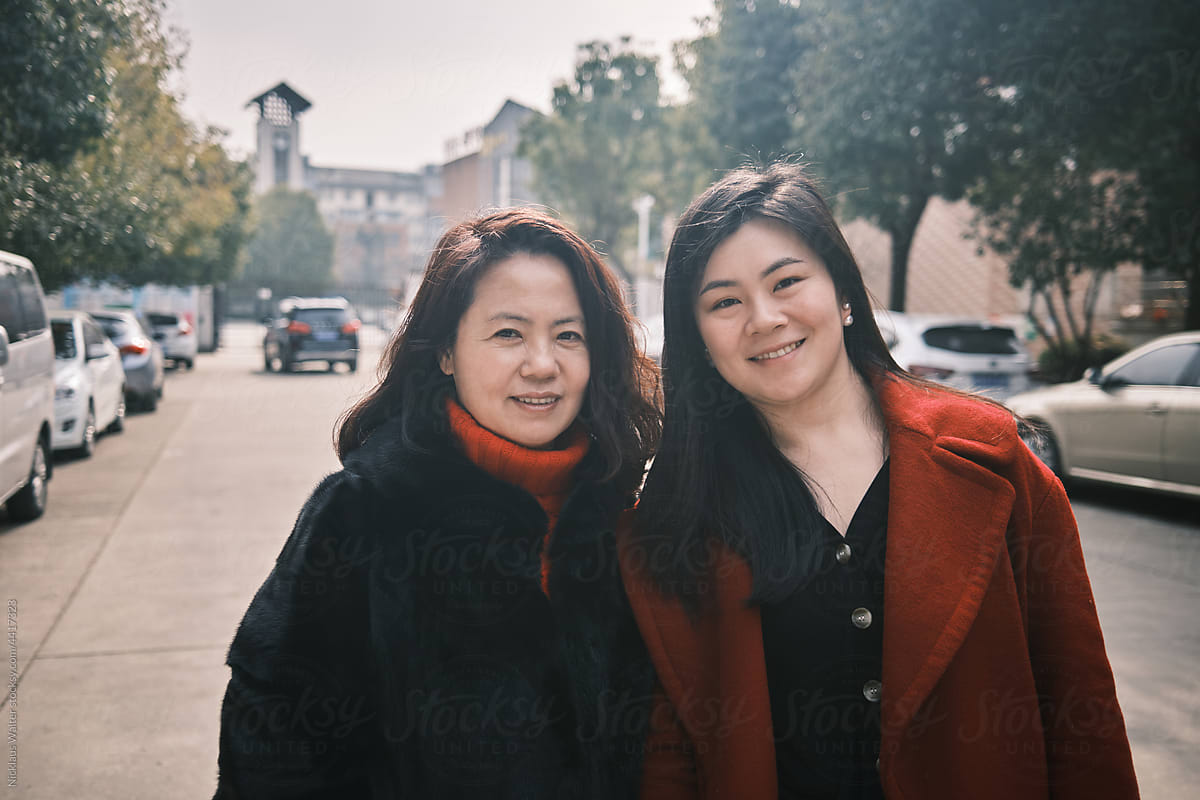 Happy Chinese Mother And Daughter Portrait During Chinese New Year