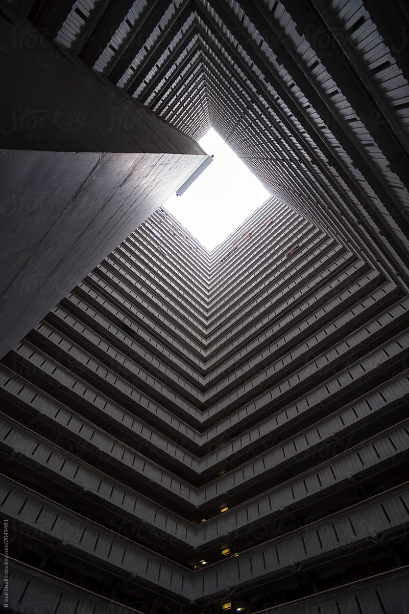 Squared residencial building photograph from the courtyard in Hong Kong