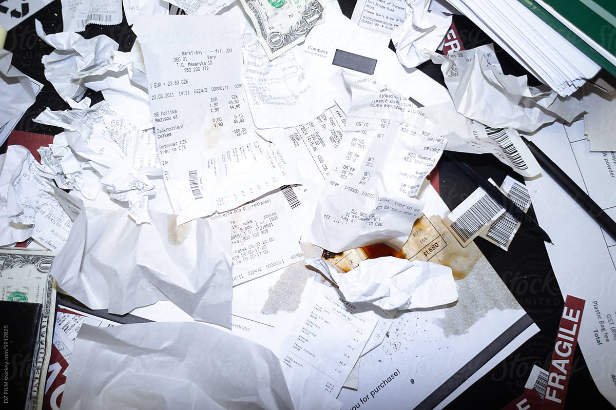 Crumpled receipts on the table