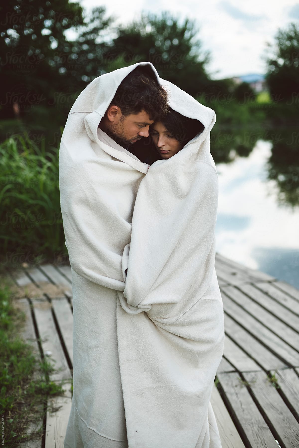 Couple Wrapped In Blanket Outdoors By Stocksy Contributor Simone Wave Stocksy