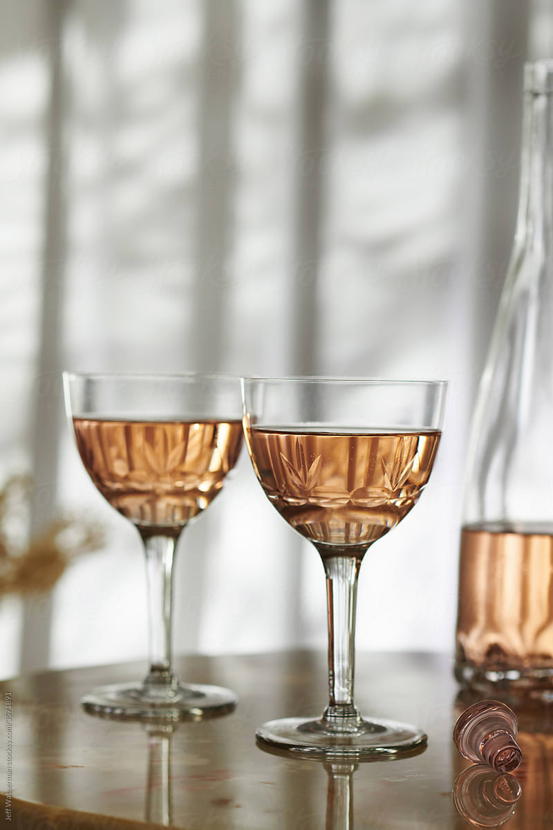 Two Glasses of Rose Wine in Vintage Glasses