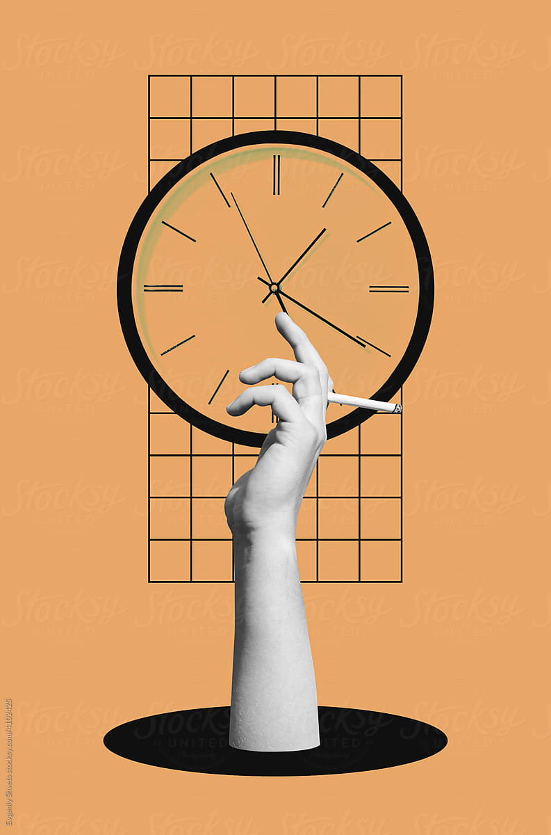 Hand holding cigarette against clock
