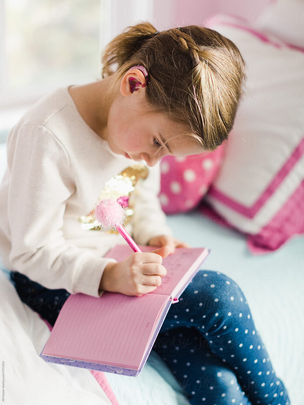 Young Girl Sitting On Bed Writing In Her Diary By Stocksy Contributor Ali Harper Stocksy 