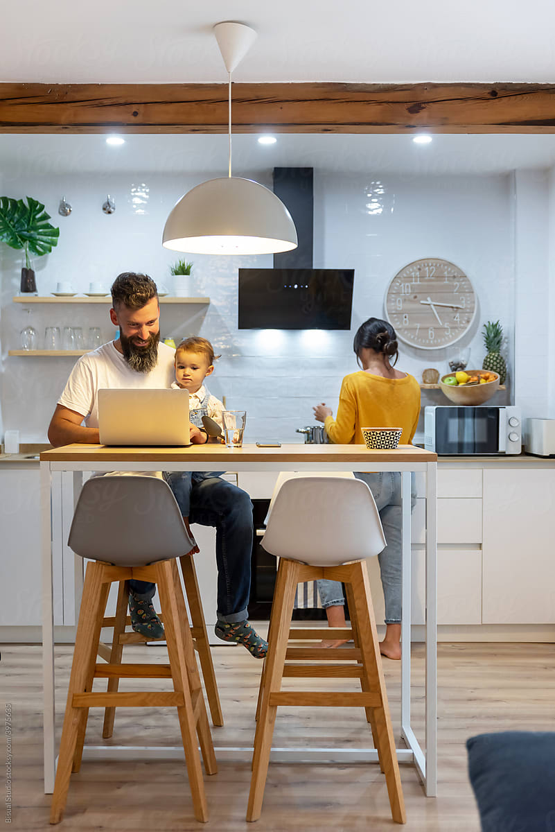 Family spending weekend together in kitchen