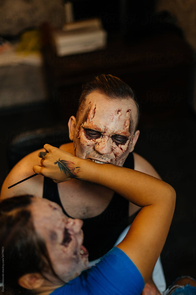 Model make up prepared for theater zombie act