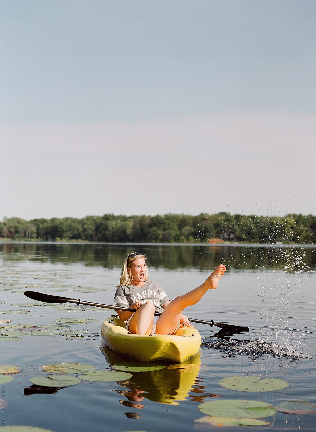 woman kayaking on lake 2