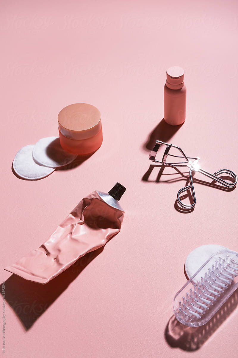 Flat lay of pink beauty products