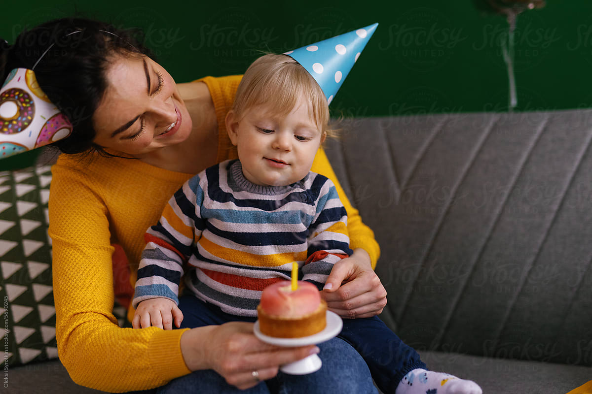 Mother son celebrate  birthday party home