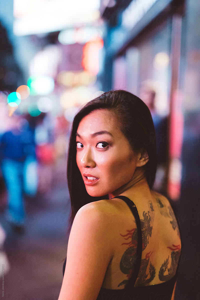 Asian Woman With A Tattoo On The Back By Stocksy Contributor Vero