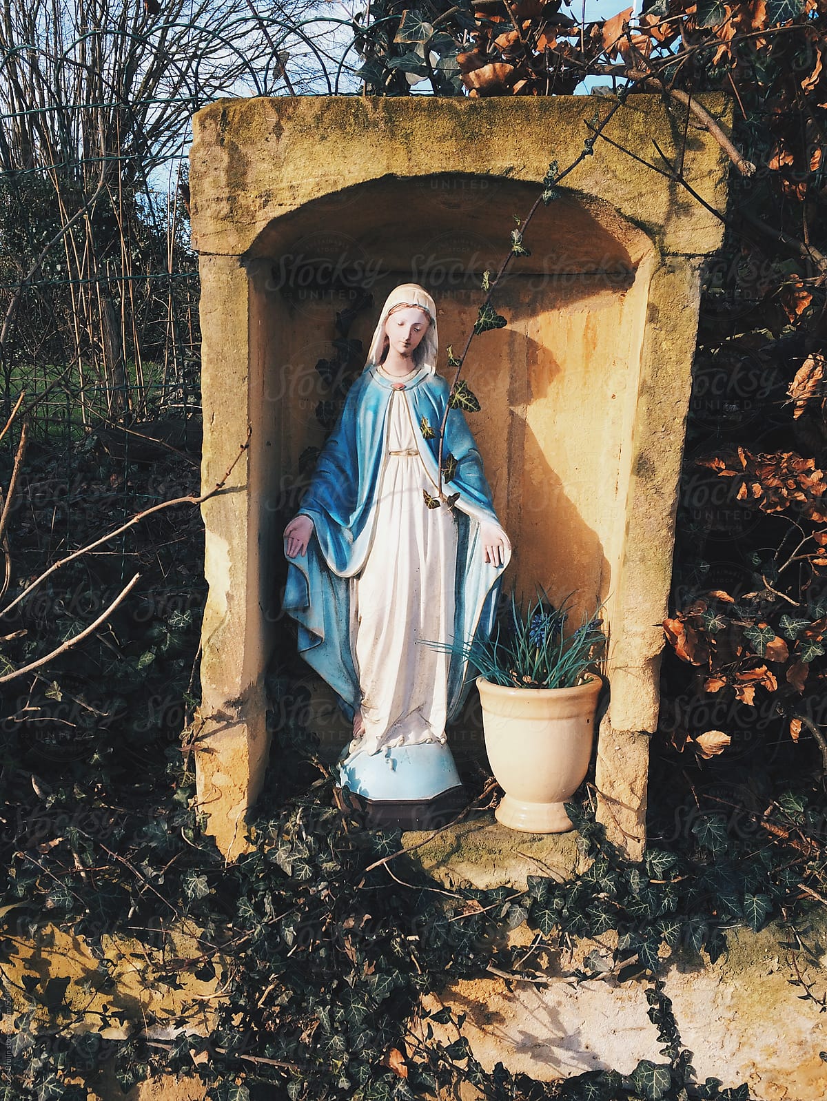 Little catholic shrine of the Holy Virgin Mary on the side of the road