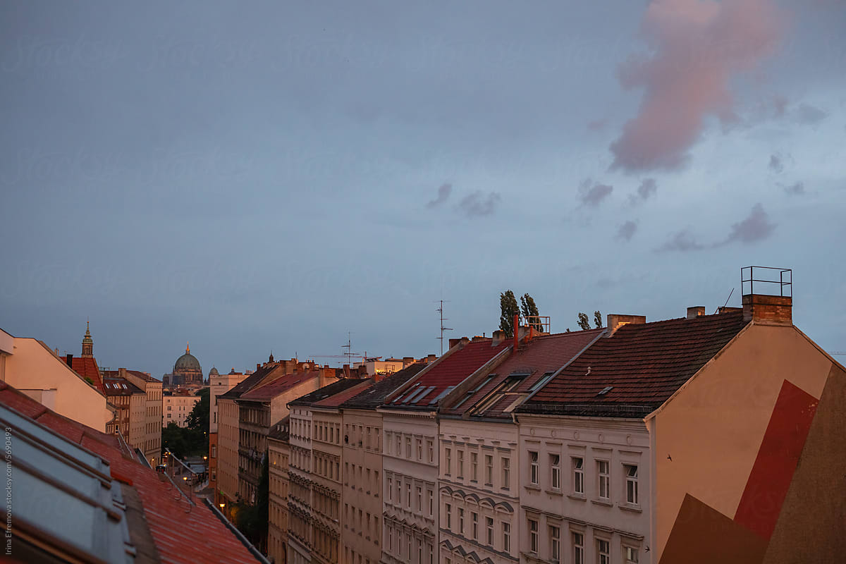 Berlin Evening Tranquility: After-Rain Sunset Over Altbau Street