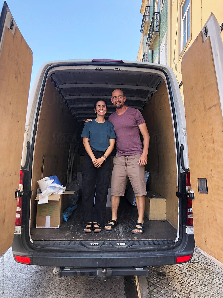 UGC portrait of couple with relocation van