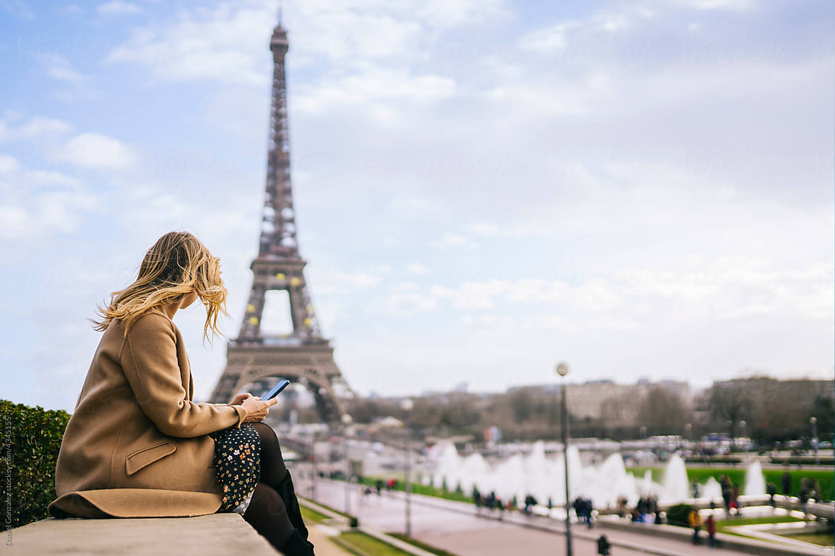 Stylish lady enjoying view of Eiffel Tower